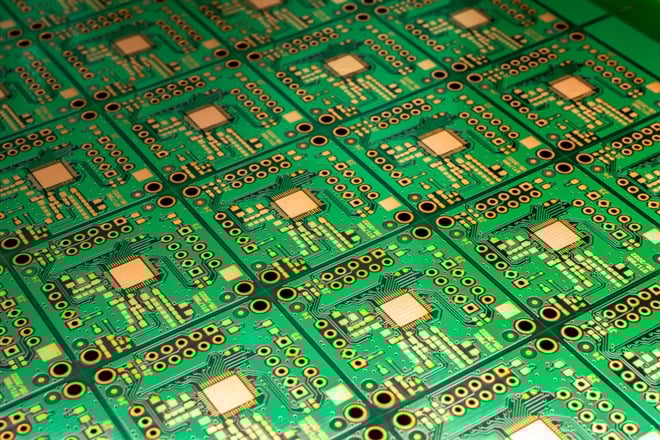 A printed circuit board in blue - Stock 168极速赛车精准数据预分析 image