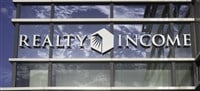 Realty Income sign on Building 